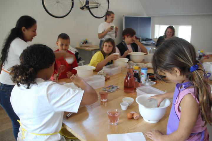 a group of people sitting at a table